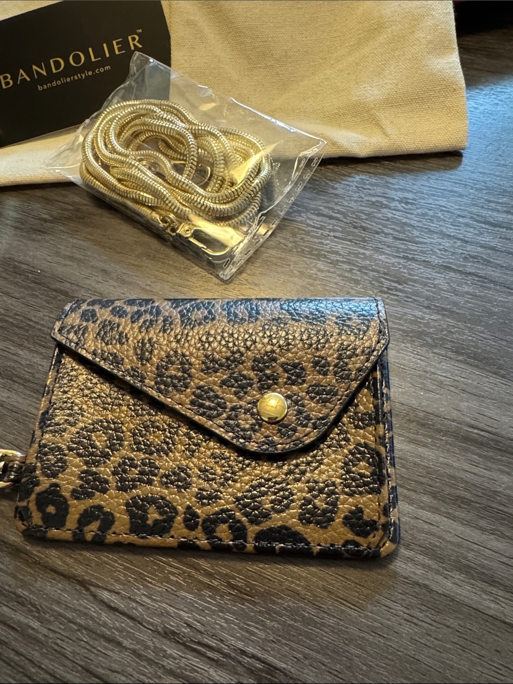Bandolier Leopard Print MagSafe  Card Wallet with Gold Hardware. Never used